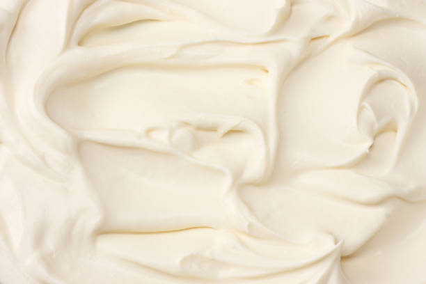 istock sour cream background. sour cream texture. top view 1098272520