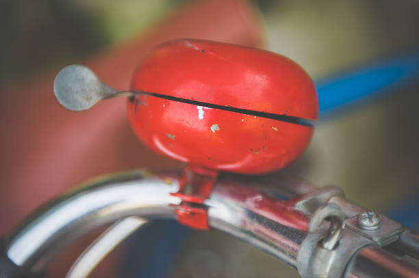 An old red bike bell