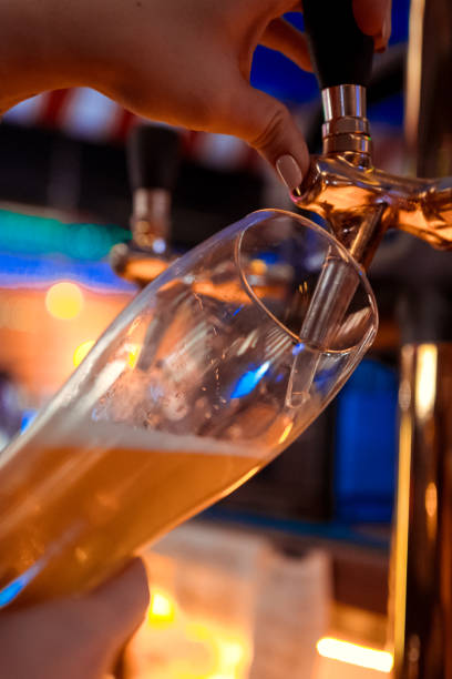 istock close-up beer tap pouring a draught lager beer 1098277042