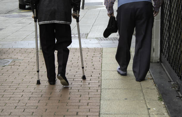istock Elderly gentlemen with cane 1098277290
