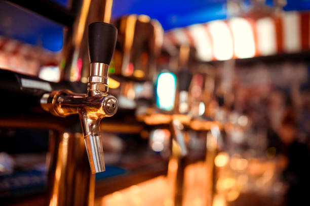 istock close-up beer tap pouring a draught lager beer 1098277488
