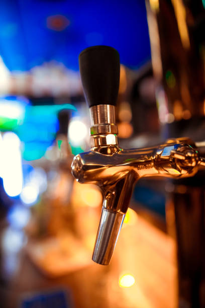 istock close-up beer tap pouring a draught lager beer 1098277508