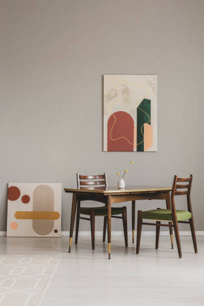istock Abstract paintings on grey wall of retro dining room interior 1098281934