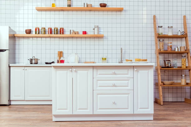 istock modern kitchen design with white furniture and tile on background 1098284966