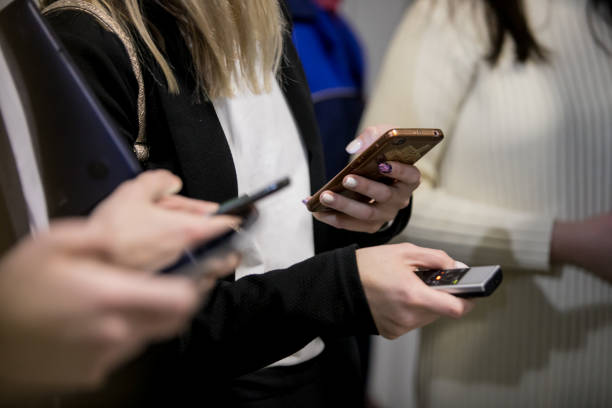 istock Journalist and camera man with microphone and recorder on smartphone application Interviewing businessman, politician 1098288098