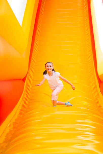 istock Happy Girl Sliding 1098296012