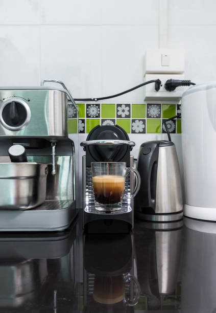istock Small coffee machine is making the espresso coffee. 1098297554