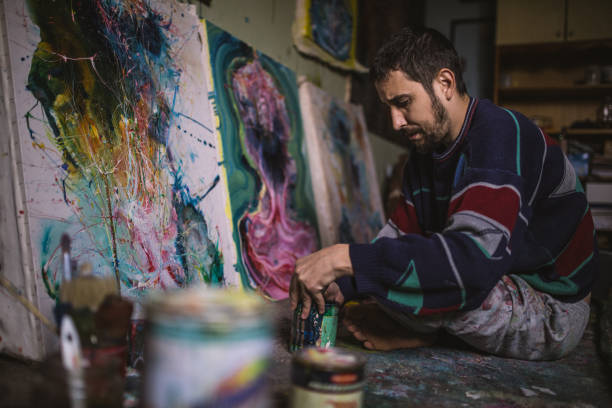 istock Artist painting on the floor 1098299552