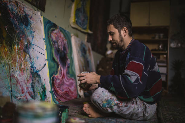 istock Man artist working in his studio 1098300278