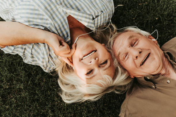 istock Hilarious laughing mature pair spending time together 1098300732