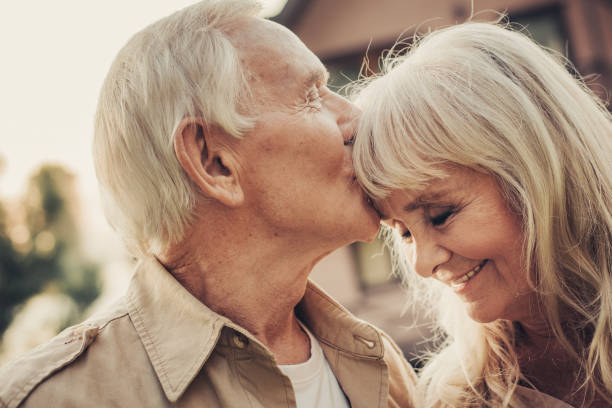 istock Mature tender man caressing to his lady 1098300788