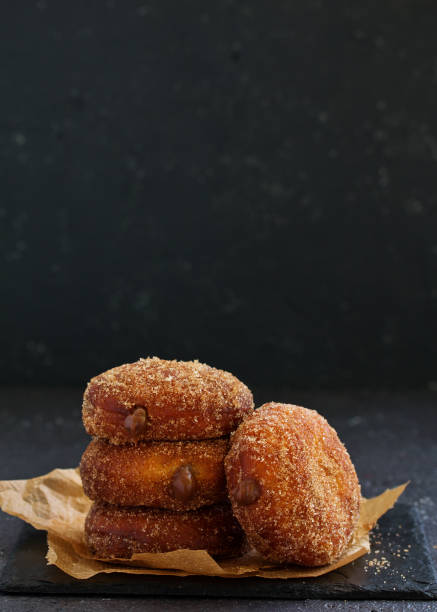 istock Donuts with cinnamon and chocolate cream. Homemade baking. Selective focus. 1098302450