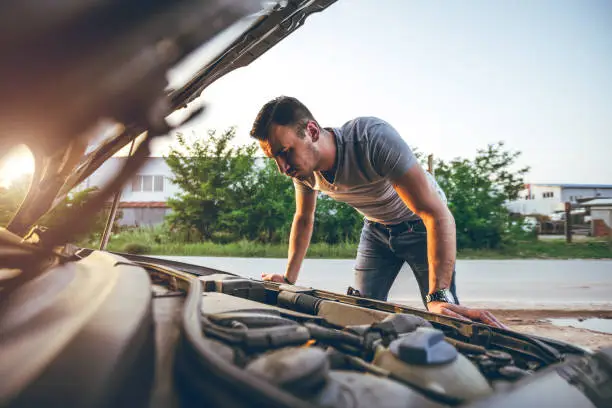 Photo of Looking under car hood