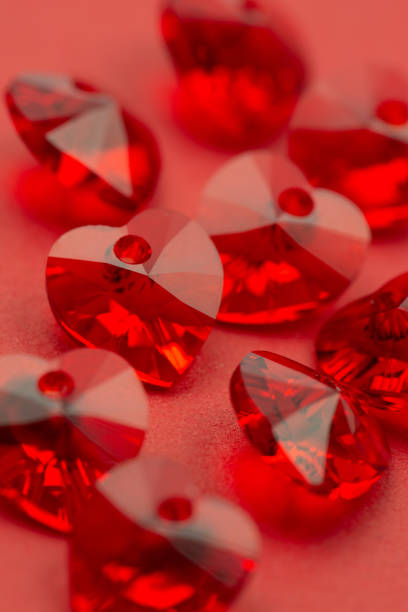 istock Red heart crystal on red paper, valentine's background 1098304214