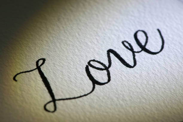 istock Love wording on paper, valentine's background 1098304248