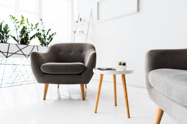 istock modern interior of white waiting hall with grey armchairs and table 1098306172