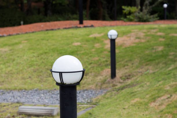 White round shaped garden lights in the daytime at garden