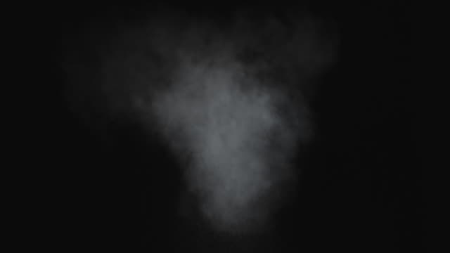 Dusty bullet hits on a wall, white powder explosion VFX elements.