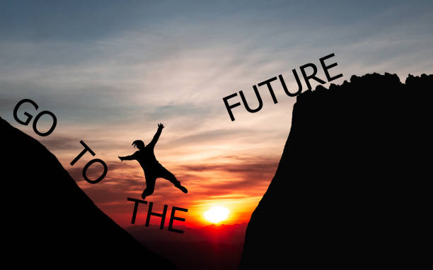 istock creative idea concept  People jumping over the mountains 1098313134