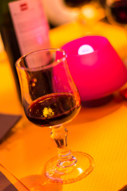 istock Red wine in a glass close-up on a table in a restaurant 1098313658