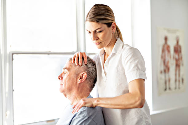 istock A Modern rehabilitation physiotherapy worker with senior client 1098314166