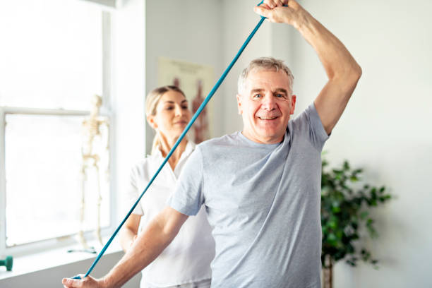 istock A Modern rehabilitation physiotherapy worker with senior client 1098314294