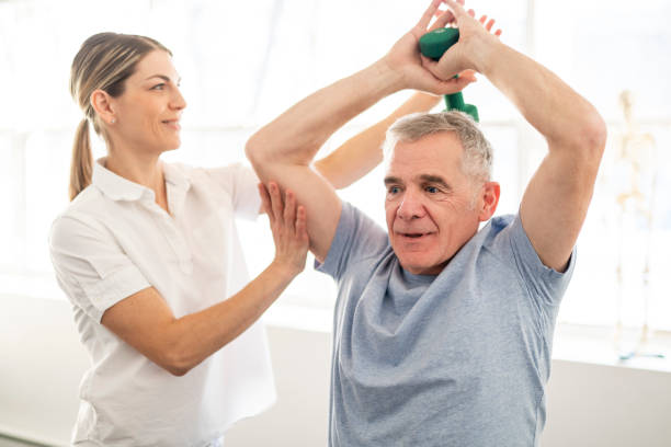 istock A Modern rehabilitation physiotherapy worker with senior client 1098314382