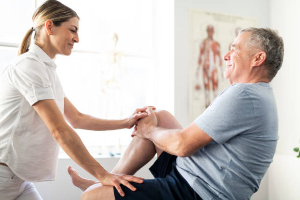 istock A Modern rehabilitation physiotherapy worker with senior client 1098314414