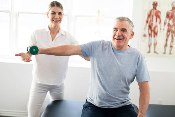 istock A Modern rehabilitation physiotherapy worker with senior client 1098314718