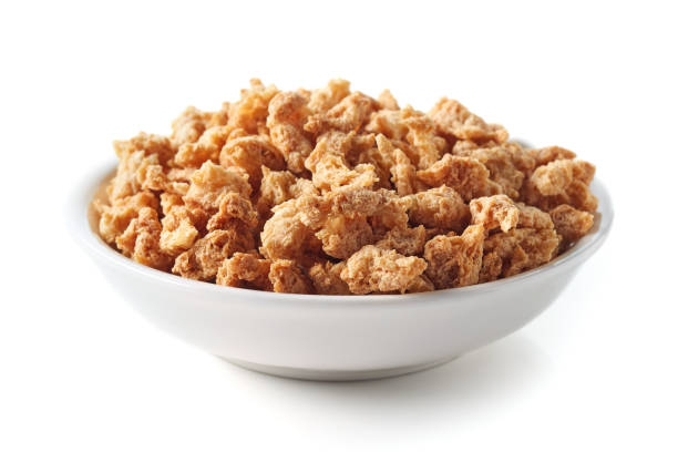 istock Bowl of soya chunks on white background 1098316564
