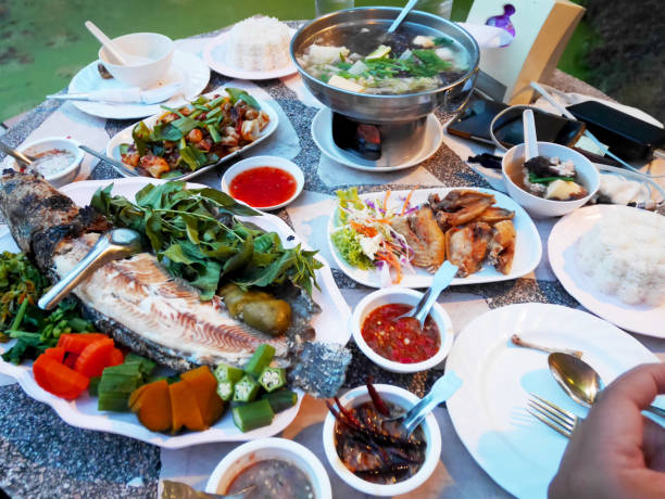 istock Traditional dinner cuisine food set  thai style on table at restaurant 1098326664