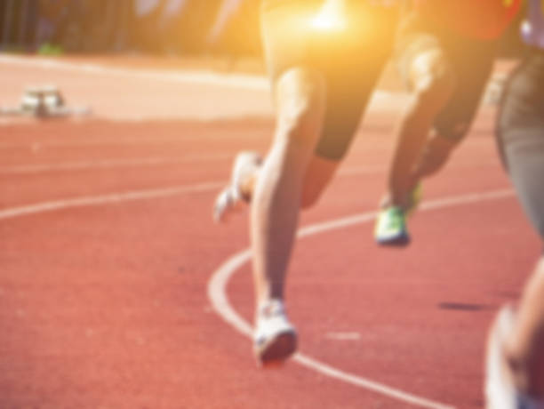 istock blur of runners in marathon abstract 1098326796