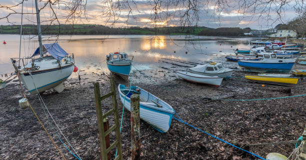 istock Boats on Moorings at low tide in Malpas, Cornwall 1098334282