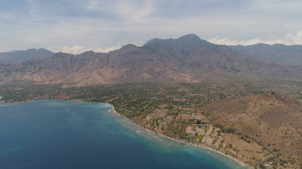 istock tropical landscape with, mountains, beach 1098336380