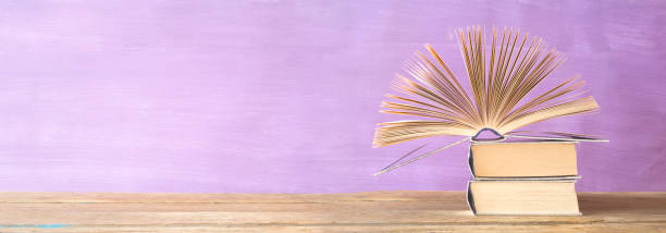 istock opened book, panorama, reading,learning education, literature, good copy space 1098336596