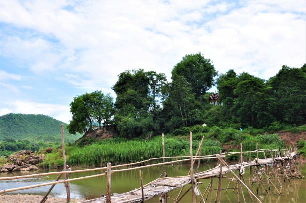istock Bamboo bridge over River Mekong 1098337386