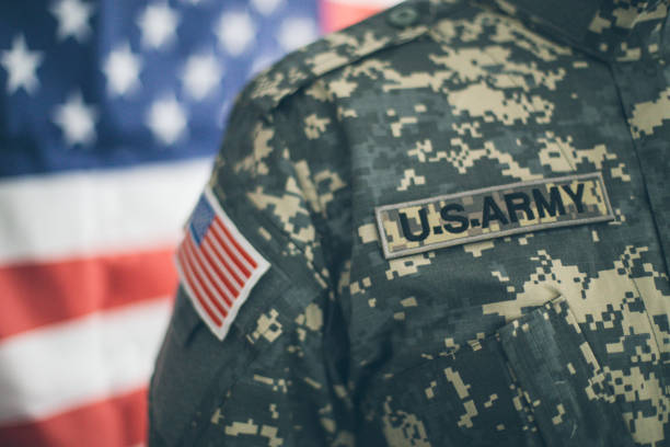 istock USA flag and US Army patch on solder's uniform 1098337542