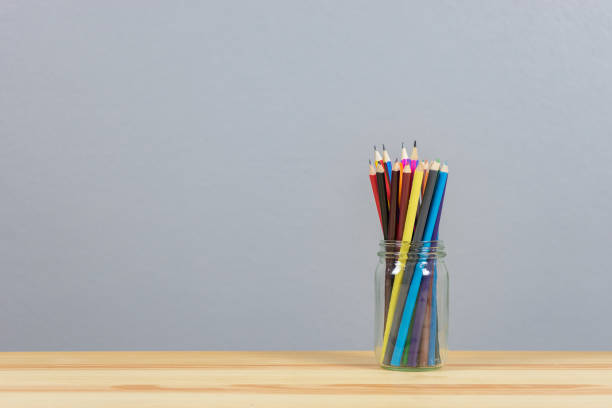 istock Assortment of colored pencils  Drawing on wood desk table,copy space ,selective focus 1098337580