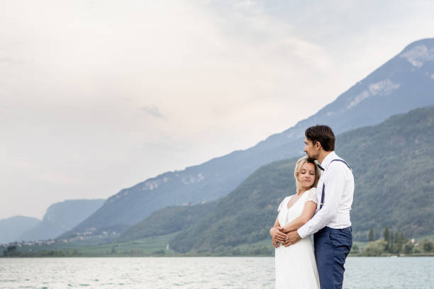 istock Beautyful wedding couple relaxing 1098338148