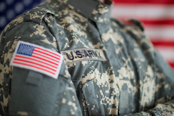 istock USA flag and US Army patch on solder's uniform 1098338466