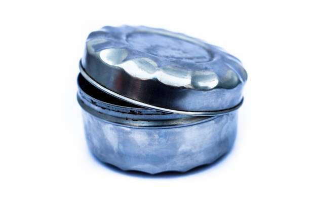 istock Close up of white or silver colored shiny container isolated on white. 1098346310