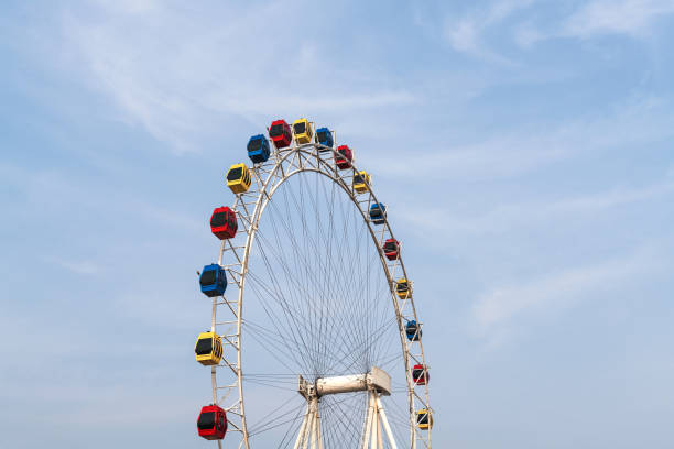 istock Colored ferris wheel with blue sky in Nanjing, China 1098348292