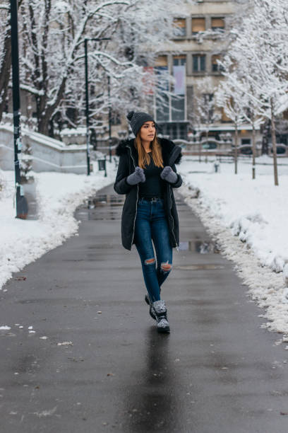 istock Woman takes a walk on winter day 1098349492