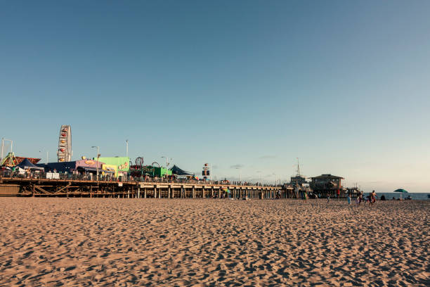 istock People on Santa Monica Beach at sunset time 1098349552