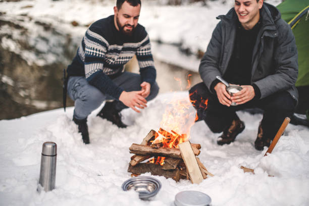 istock Two men camping near lake 1098352076