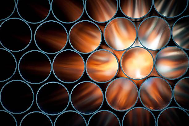 трубопроводы - shiny pipe metal tube стоковые фото и изображения
