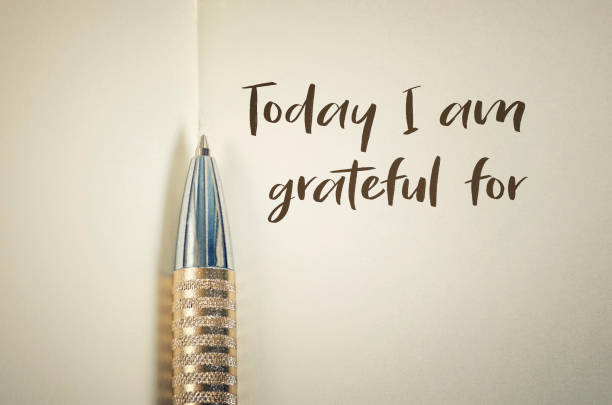 Gratitude Close up of gratitude word with pen on notebook calligraphy photos stock pictures, royalty-free photos & images