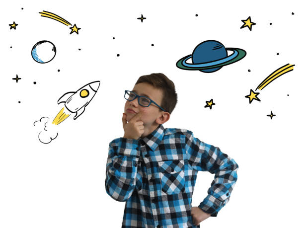 istock Young boy child think idea dreaming imagination space stars 1098359338