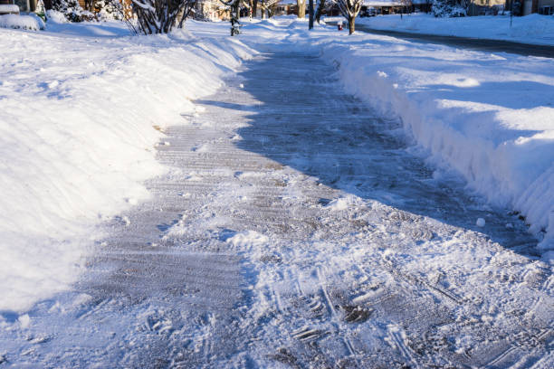 Cleared Sidewalk After Heavy Winter Storm in Michigan stock photo