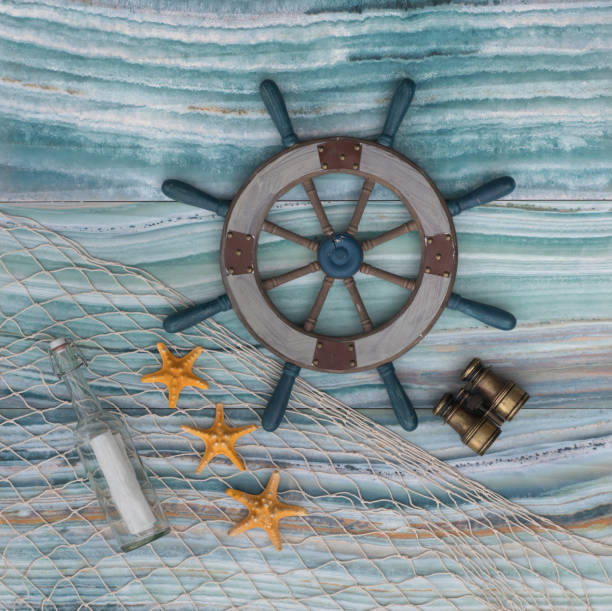 istock ship's steering wheel on the sea background 1098360620
